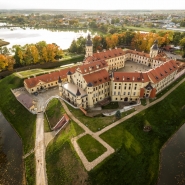 Castle in Nesvizh from the height of a drone. Taking pictures with quadrocopters in Minsk in Belarus. Aerial survey in Minsk. Fl